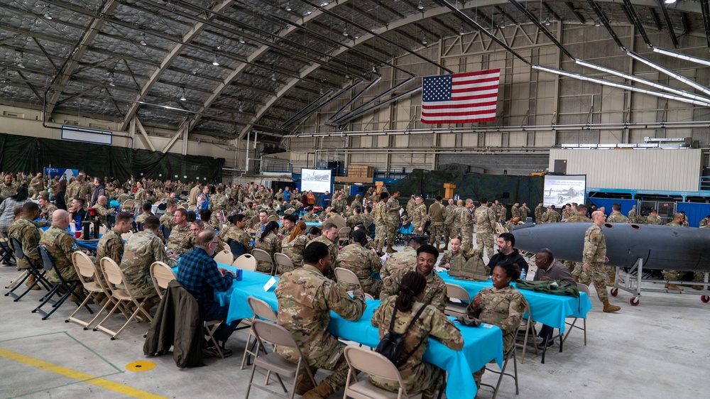 U.S. service members and their families celebrate the Air Force Bash at Hangar 3 at Joint Base Elmendorf-Richardson, Alaska, Sept. 22, 2023.