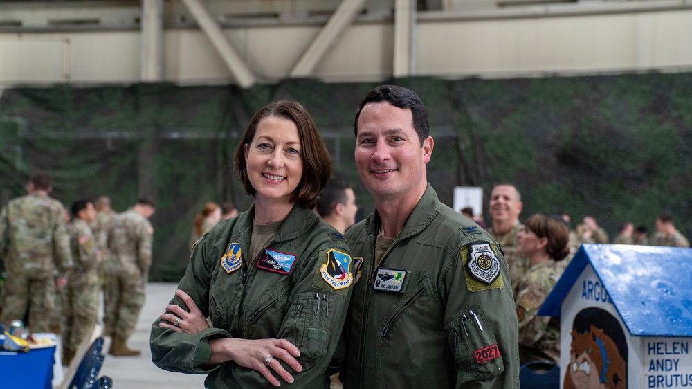 U.S. Air Force Col. Kevin Jamieson, 3rd Wing commander, poses with his wife, Col. Jammie Jamieson, during an Air Force Bash at Hangar 3 at Joint Base Elmendorf-Richardson, Alaska, Sept. 22, 2023.