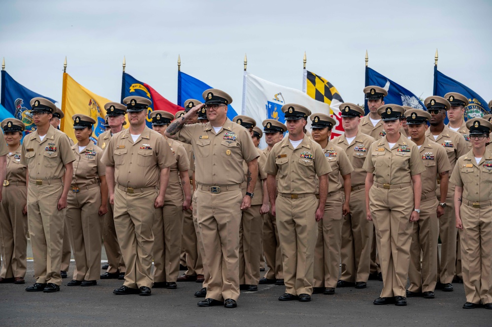 Senior Enlisted Leader Salutes During Chief Pinning Ceremony