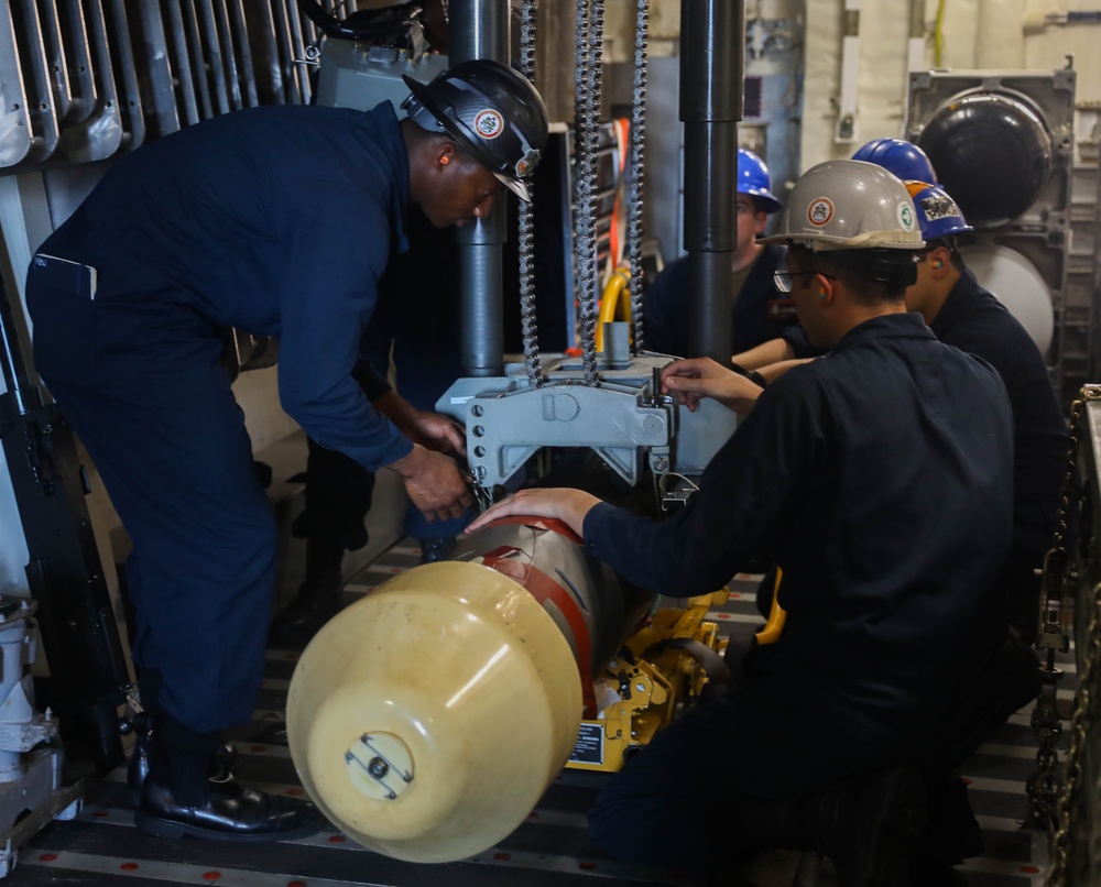 Sailors Conduct a Torpedo Upload Aboard USS Rafael Peralta (DDG 115)