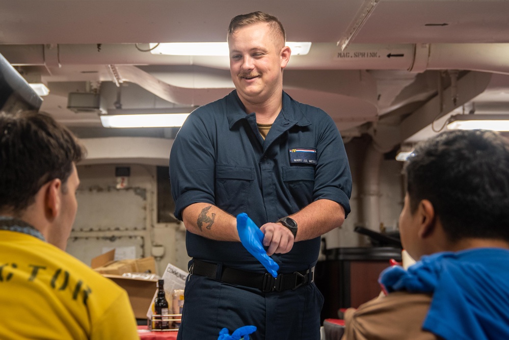 USS Ronald Reagan (CVN 76) Sailors administer flu shots