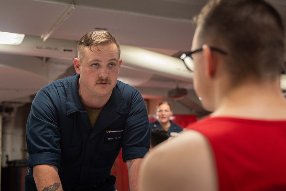 USS Ronald Reagan (CVN 76) Sailors administer flu shots