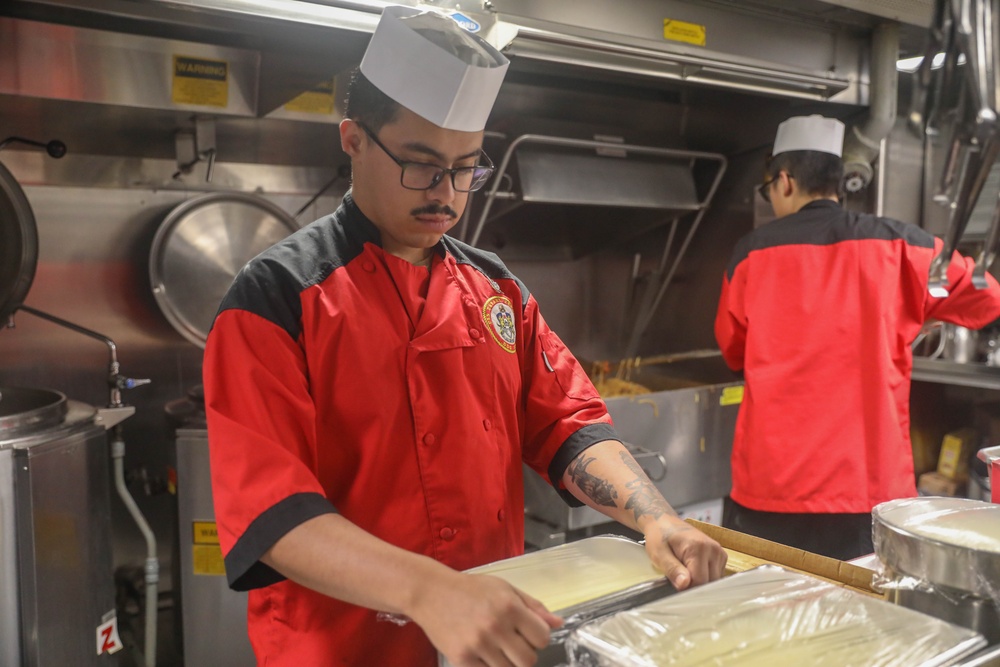 Culinary Specialists Prepare Lunch for the Crew Aboard the Arleigh Burke-class guided-missile destroyer USS Rafael Peralta (DDG 115) in the South China Sea