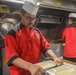 Culinary Specialists Prepare Lunch for the Crew Aboard the Arleigh Burke-class guided-missile destroyer USS Rafael Peralta (DDG 115) in the South China Sea