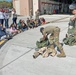 173rd Fighter Wing Airmen demonstrate donning chemical warfare protective gear.