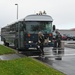 Airmen from the 173rd Fighter Wing board the bus headed South to support a deployment to Kadena Air Base, Japan.