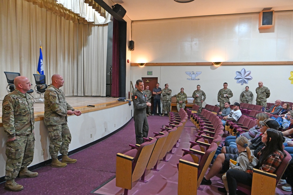 U.S. Air Force Colonel Adam Gaudinski, 173rd Maintenance Group commander, addresses personnel before they depart on a deployment to Kadena Air Base, Japan.