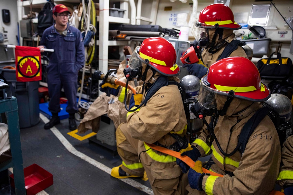 USS Ralph Johnson conducts general quarters drill.