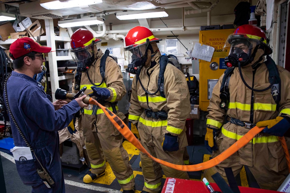 USS Ralph Johnson conducts general quarters drill.