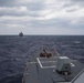 USS Ralph Johnson conducts RAS with USNS Tippecanoe.