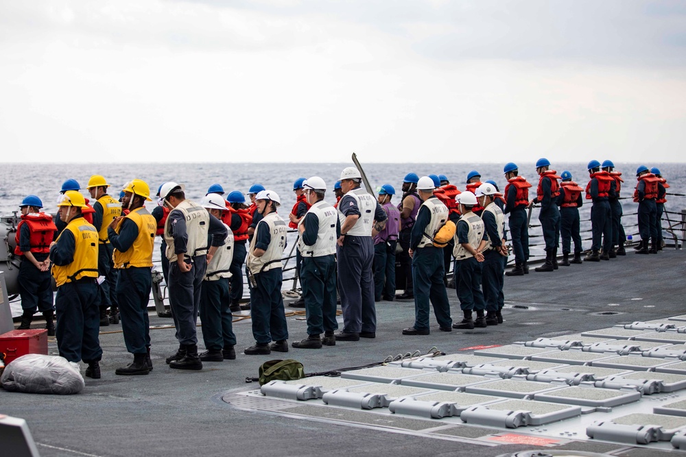 USS Ralph Johnson conducts RAS with USNS Tippecanoe.