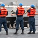 USS Ralph Johnson conducts RAS with USNS Tippecanoe.