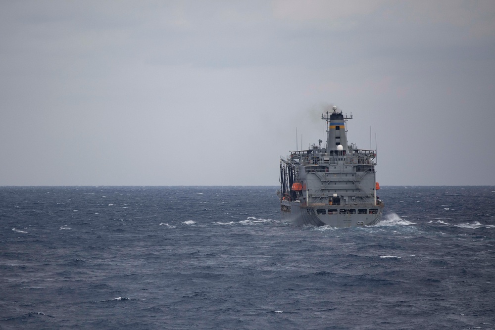 USS Ralph Johnson conducts RAS with USNS Tippecanoe.