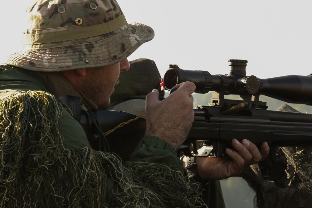 Albanian Sniper Cycling His Weapon