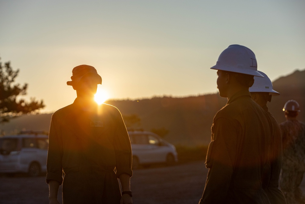 All in a day's work - Japan Ground Self-Defense Force, U.S. Marines, and Sailors prepare Kirishima Training Area for airfield damage repair training