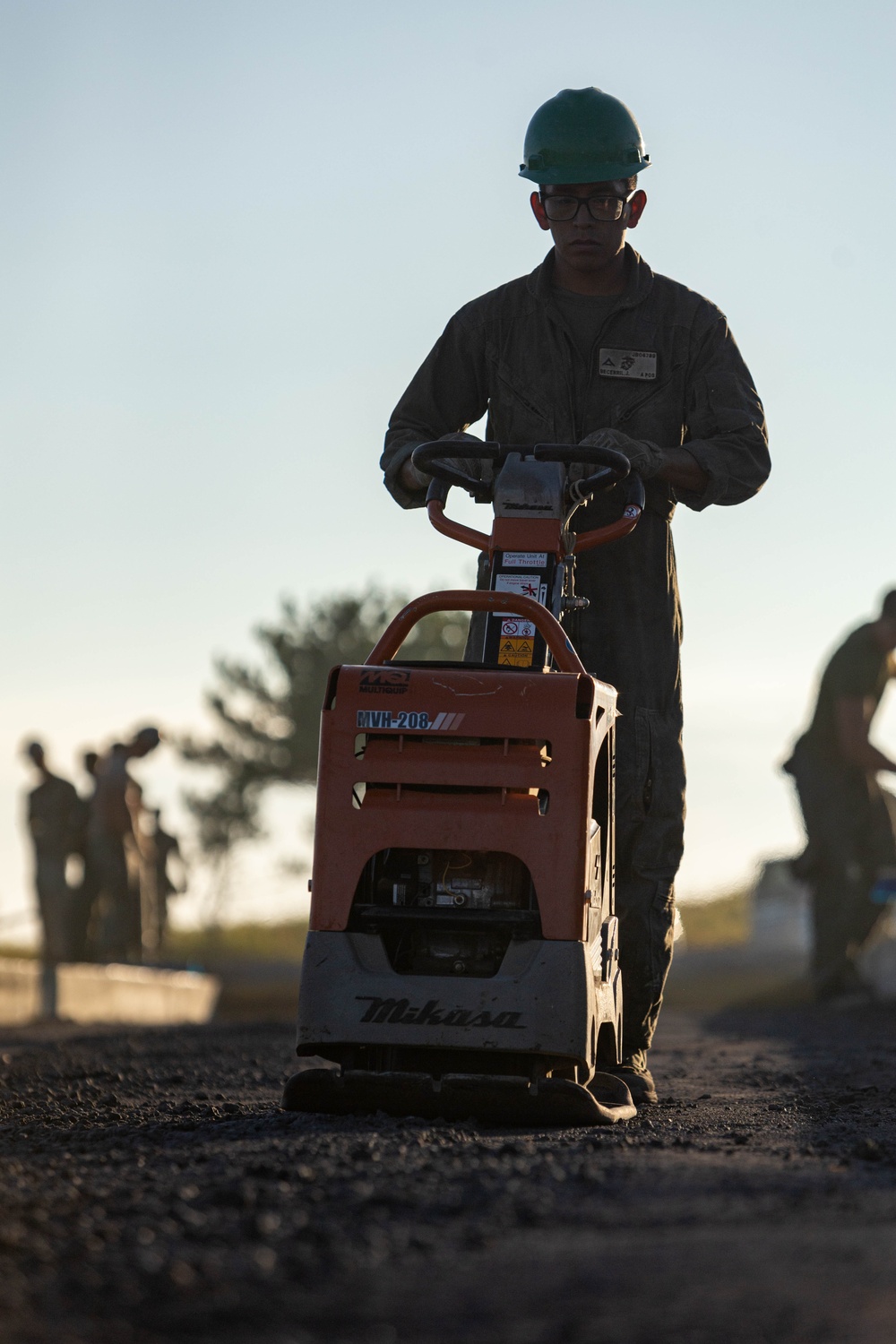 All in a day's work - Japan Ground Self-Defense Force, U.S. Marines, and Sailors prepare Kirishima Training Area for airfield damage repair training