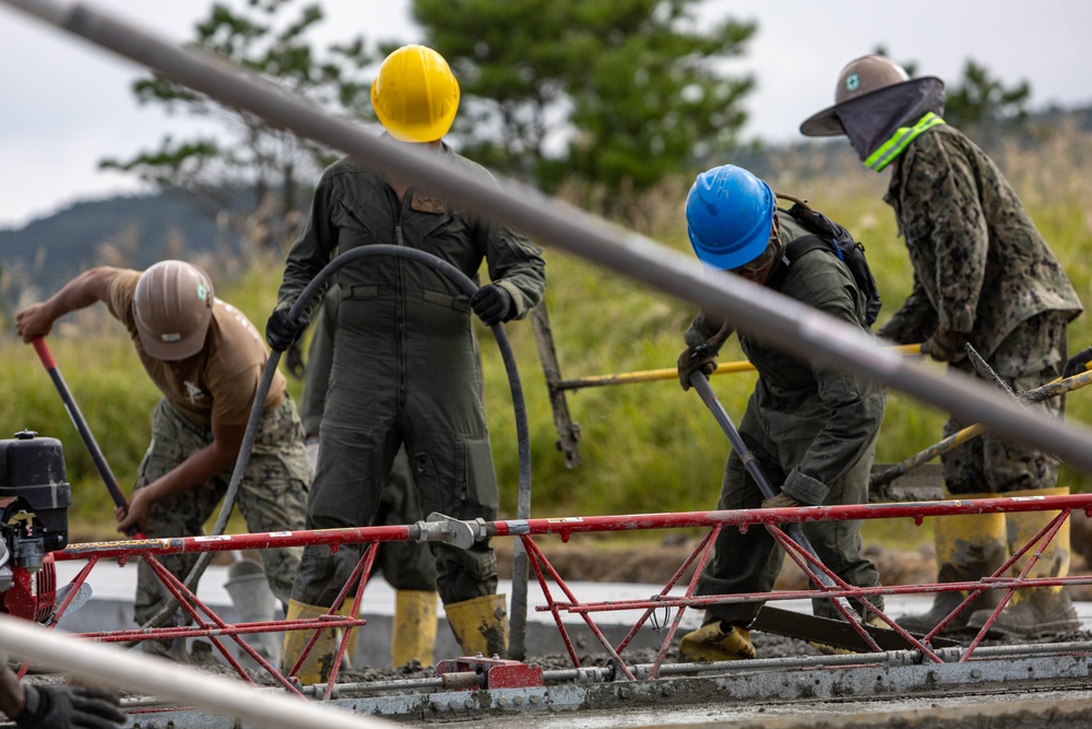 All in a day's work - Japan Ground Self-Defense Force, U.S. Marines, and Sailors prepare Kirishima Training Area for airfield damage repair training