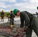 All in a day's work - Japan Ground Self-Defense Force, U.S. Marines, and Sailors prepare Kirishima Training Area for airfield damage repair training