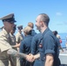 The Arleigh Burke-class guided-missile destroyer USS Rafael Peralta (DDG 115) hosts a chief pinning ceremony on the foc’sle in the South China Sea