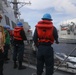 Sailors aboard the Arleigh Burke-class guided-missile destroyer USS Rafael Peralta (DDG 115) conduct a replenishment at sea with the Lewis and Clark-class dry cargo USNS Wally Schirra (T-AKE-8) in the South China Sea