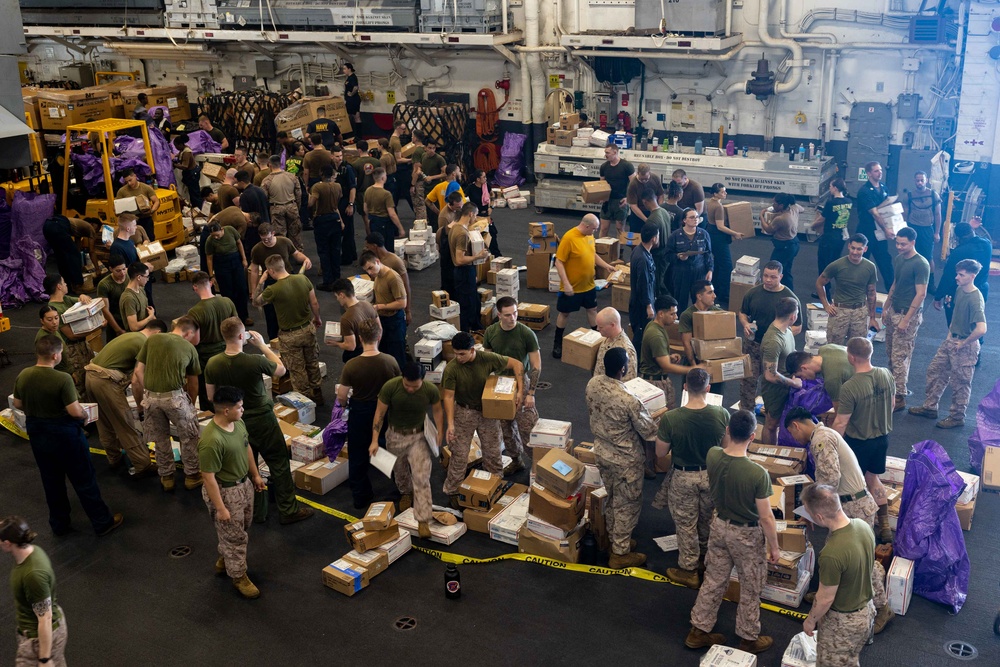 USS Bataan Sailors receive mail