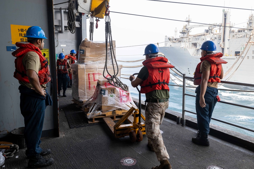 USS Bataan Sailors receive mail