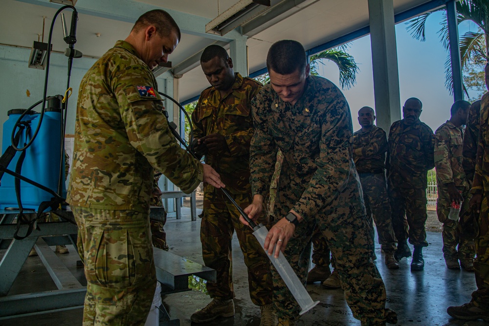 KM23: U.S. Sailors teach PNGDF Soldiers Vector Control Methods