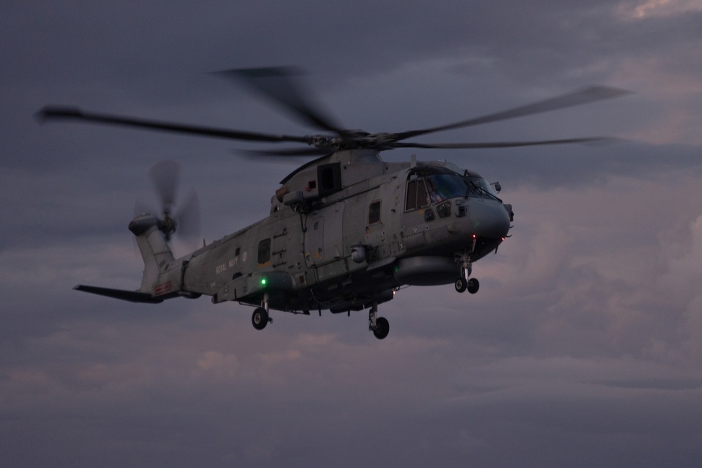 Marine Medium Tiltrotor Squadron (VMM) 365 lands MV-22B Ospreys aboard the Royal Navy's HMS Prince of Wales with 820 Naval Air Squadron