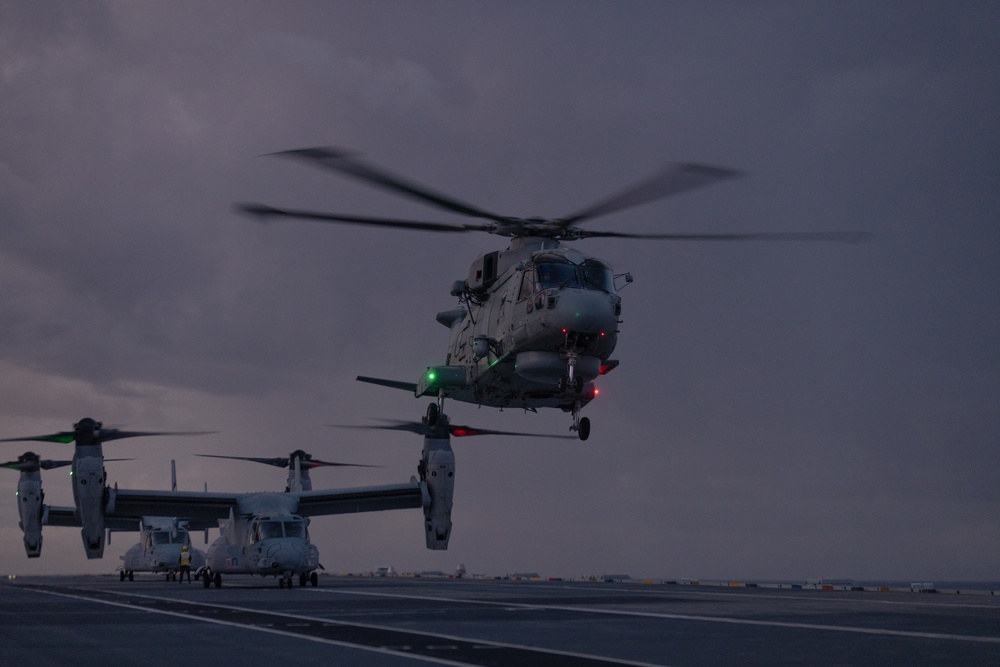 Marine Medium Tiltrotor Squadron (VMM) 365 lands MV-22B Ospreys aboard the Royal Navy's HMS Prince of Wales with 820 Naval Air Squadron