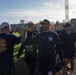 Service Members Play in a Softball Tournament