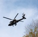 An Apache flies over Range 23 in Fort Drum, NY