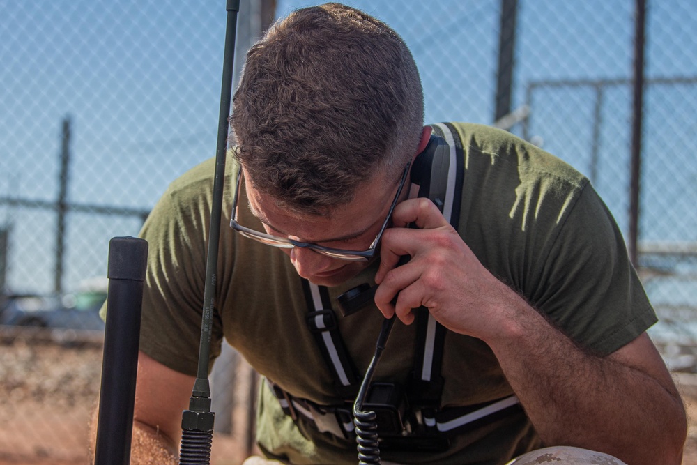 Spectrum warfare Marines set up gear during WTI 1-24