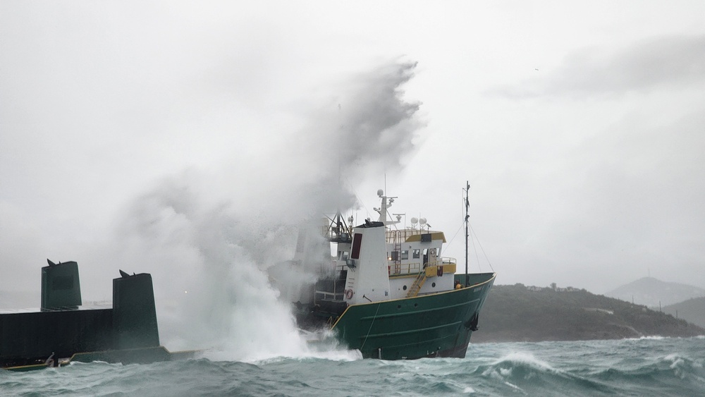 Coast Guard rescues 12 persons forced to abandon an aground cargo vessel off the coast of St. Thomas, U.S. Virgin Islands