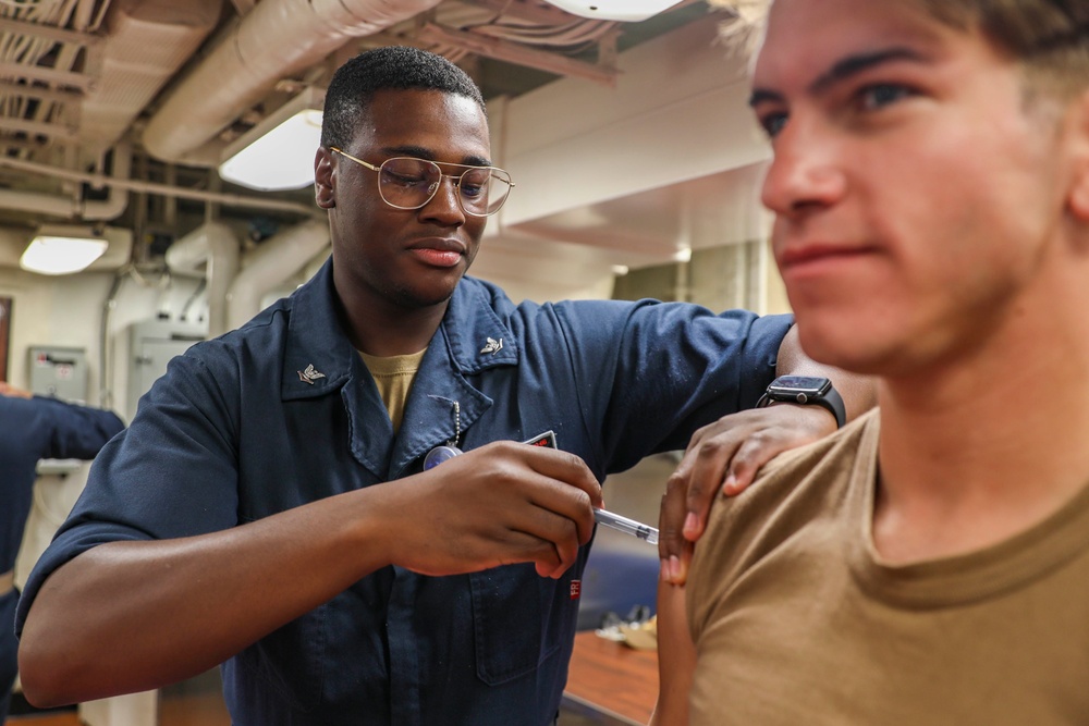 Sailors aboard USS Shoup receive influenza vaccine