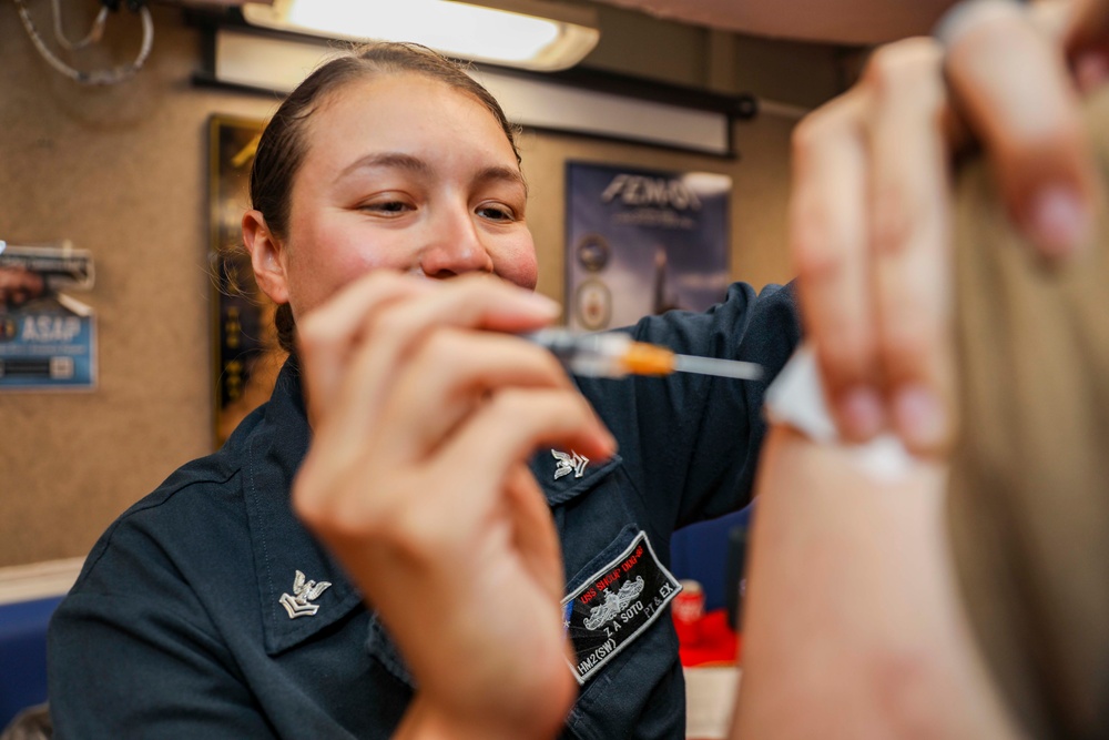 Sailors aboard USS Shoup receive influenza vaccine