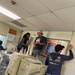 VAW-120 Sailors participate in community service project.