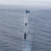 USS Ronald Reagan (CVN 76) steams in formation with guided-missile cruiser USS Antietam (CG 54), JMSDF destroyer JS Yuudachi (DD 103) and JMSDF frigate JS Noshiro (FFM 3)