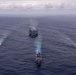 USS Ronald Reagan (CVN 76) steams in formation with guided-missile cruiser USS Antietam (CG 54), JMSDF destroyer JS Yuudachi (DD 103) and JMSDF frigate JS Noshiro (FFM 3)