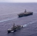 USS Ronald Reagan (CVN 76) steams in formation with guided-missile cruiser USS Antietam (CG 54), JMSDF destroyer JS Yuudachi (DD 103) and JMSDF frigate JS Noshiro (FFM 3)