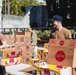 U.S. Navy Sailors distribute food to the local community during San Francisco Fleet Week