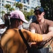 U.S. Navy Sailors distribute food to the local community during San Francisco Fleet Week