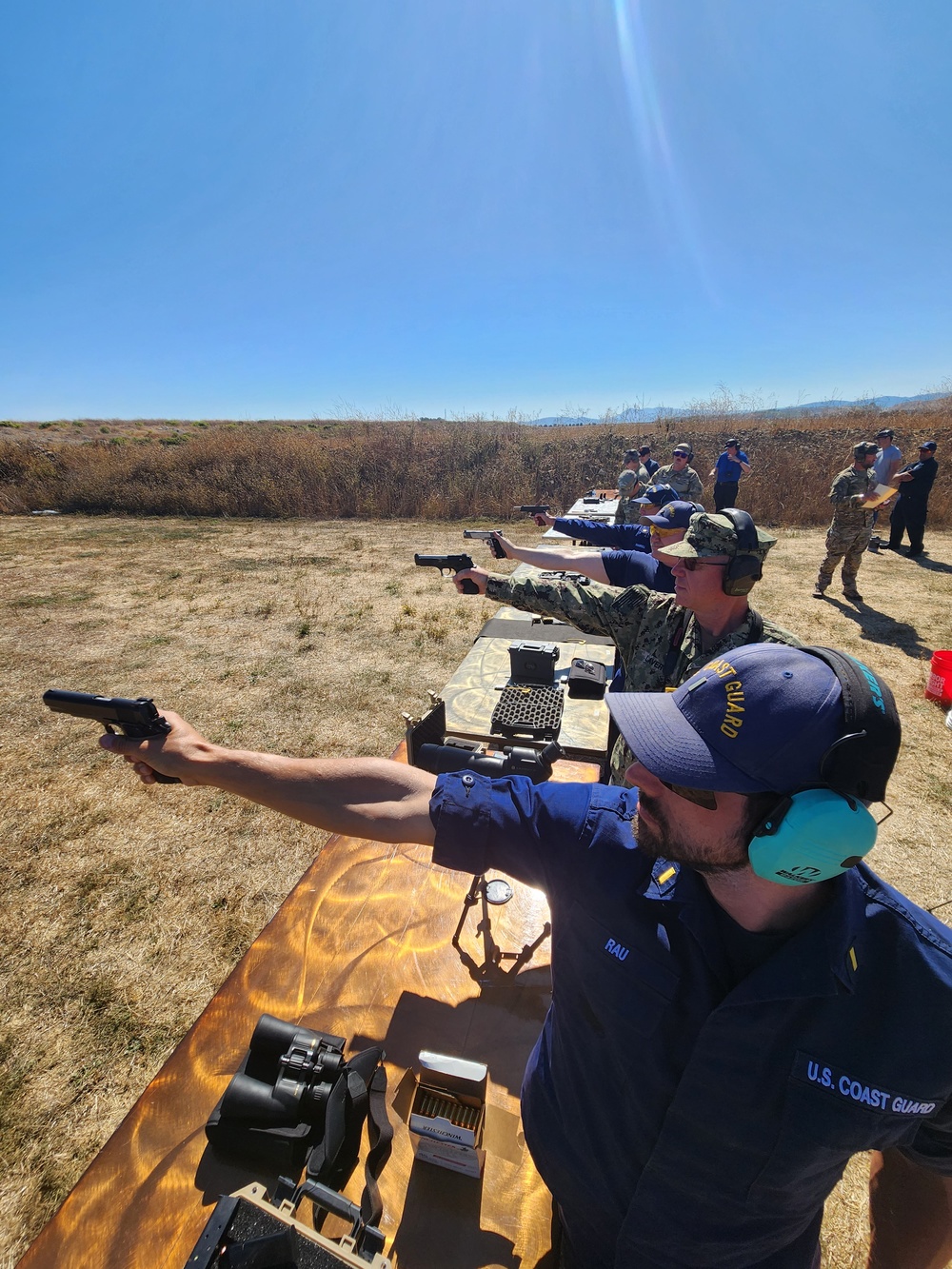 Coast Guard, Navy, Marine Corps service member participate in marksmanship competition