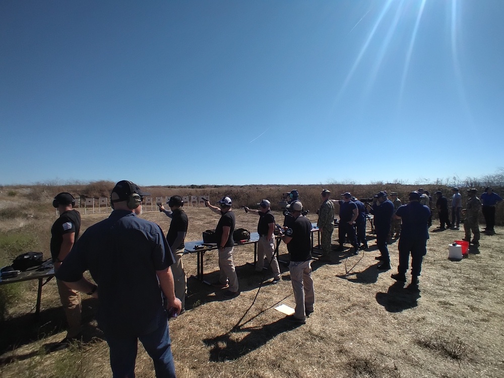 Coast Guard, Navy, Marine Corps service member participate in marksmanship competition