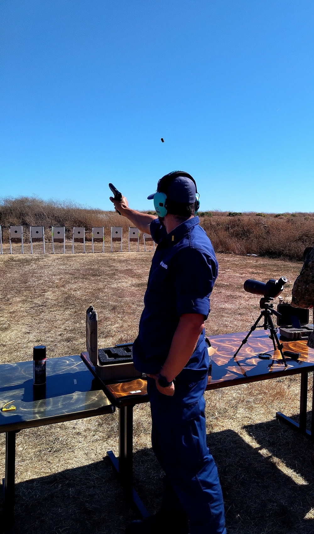 Coast Guard, Navy, Marine Corps service member participate in marksmanship competition