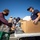 U.S. Coast Guardsmen distribute food to the local community during San Francisco Fleet Week 23 U.S. Coast Guardsmen distribute food to the local community during San Francisco Fleet Week 23