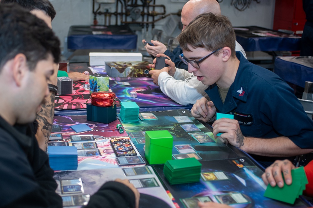 USS Ronald Reagan (CVN 76) Sailors play card games hosted by MWR