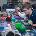 USS Ronald Reagan (CVN 76) Sailors play card games hosted by MWR