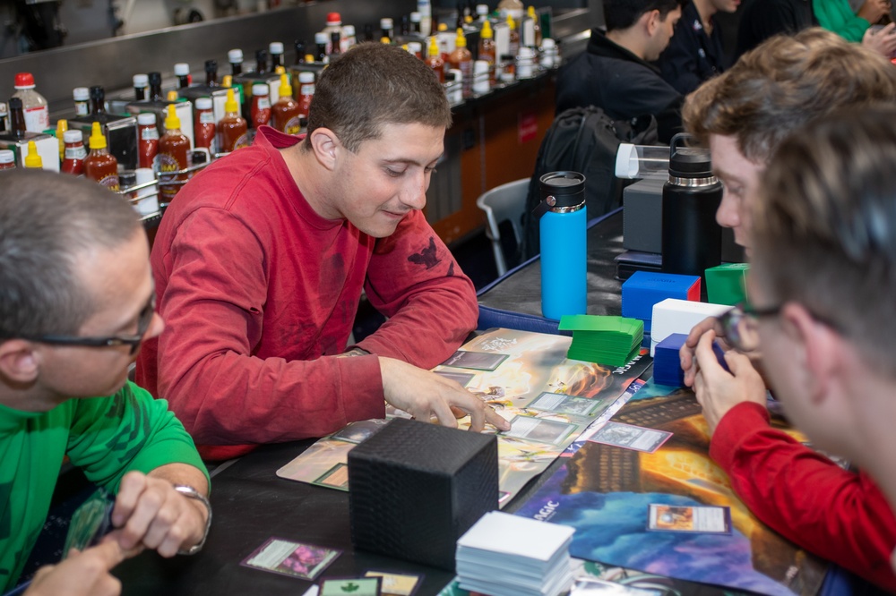 USS Ronald Reagan (CVN 76) Sailors play card games hosted by MWR