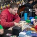 USS Ronald Reagan (CVN 76) Sailors play card games hosted by MWR