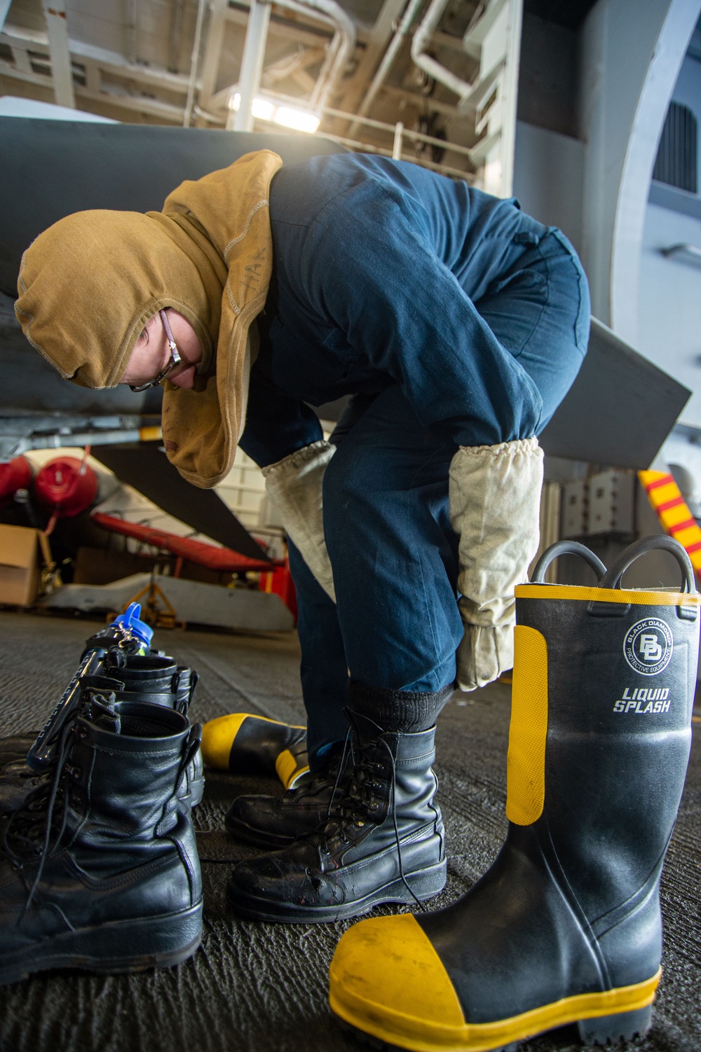 USS Ronald Reagan (CVN 76) Sailors train during a general quarters drill